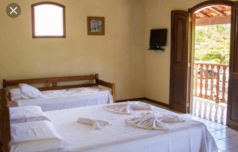 Quarto Quádruplo com Varanda