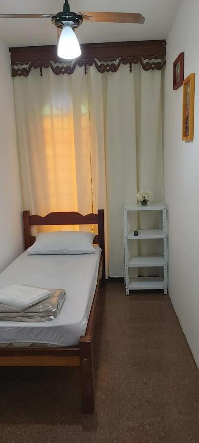 Quarto Individual com Banheiro Compartilhado