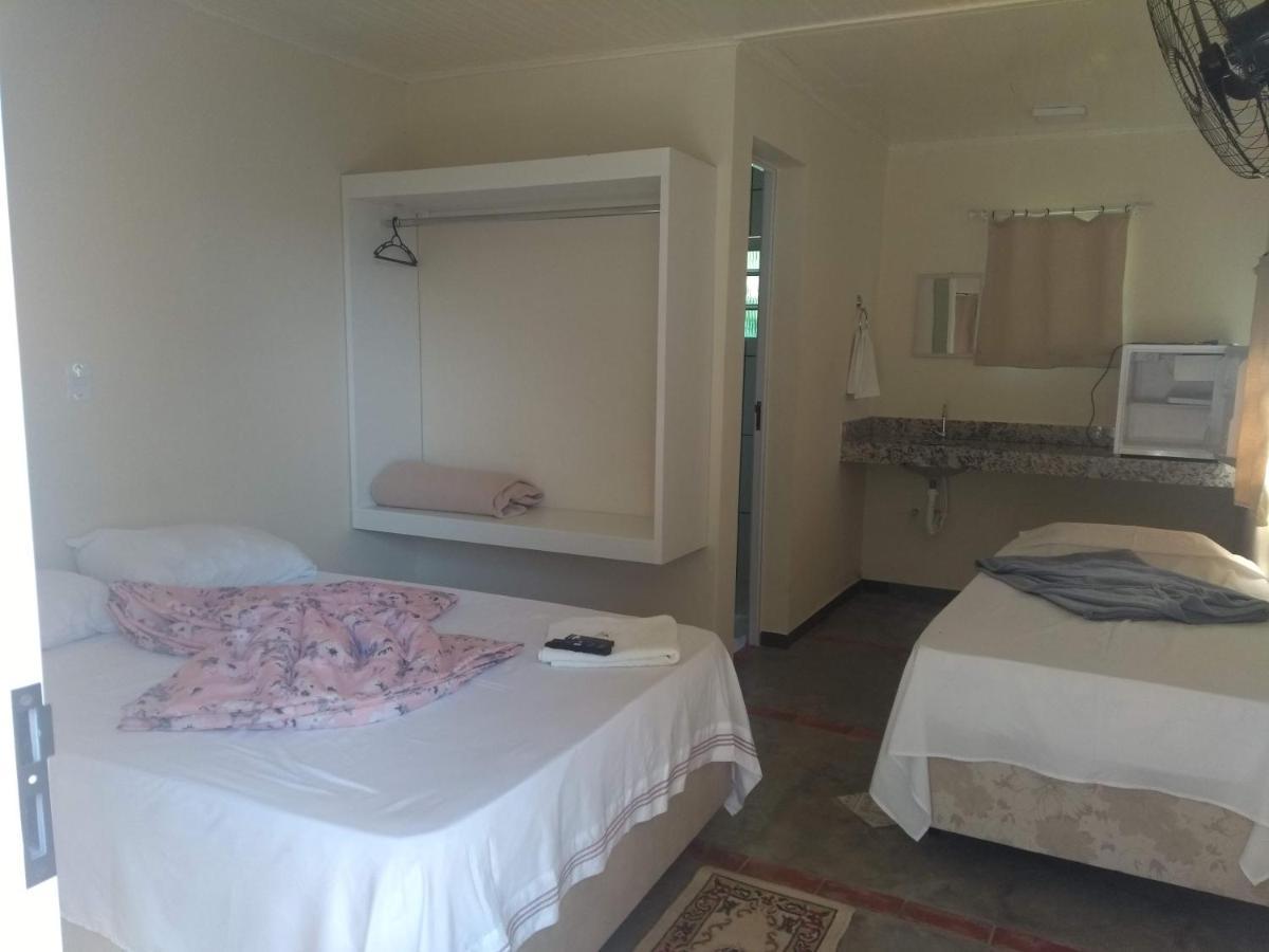 Quarto Triplo com Vista para a Piscina