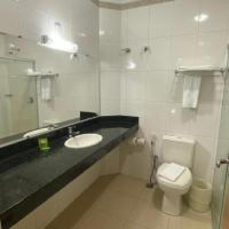Quarto Triplo com Vista para a Piscina