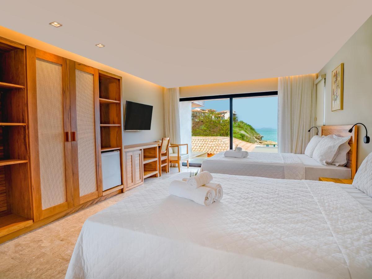 Quarto Quádruplo com Vista do Mar.