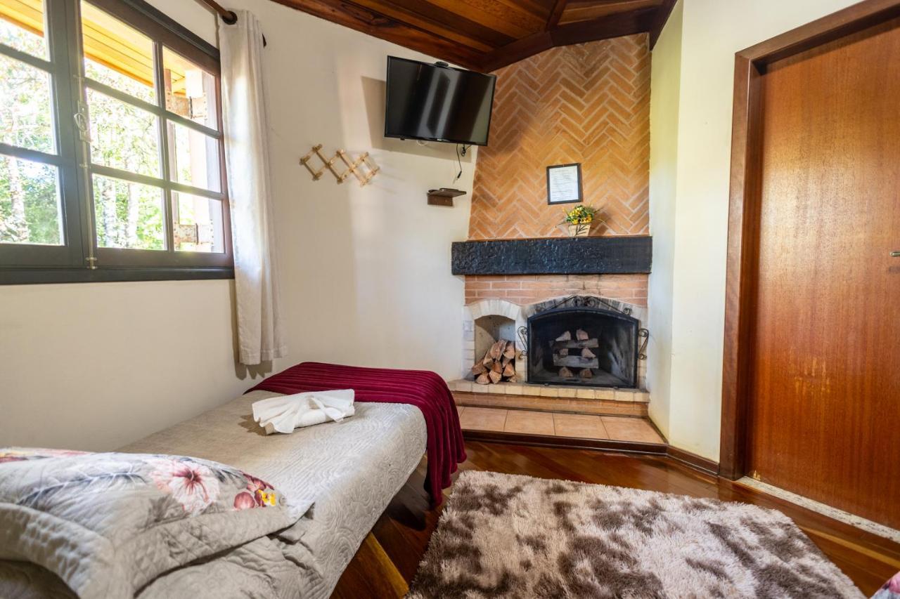 Quarto Triplo com Vista do Jardim