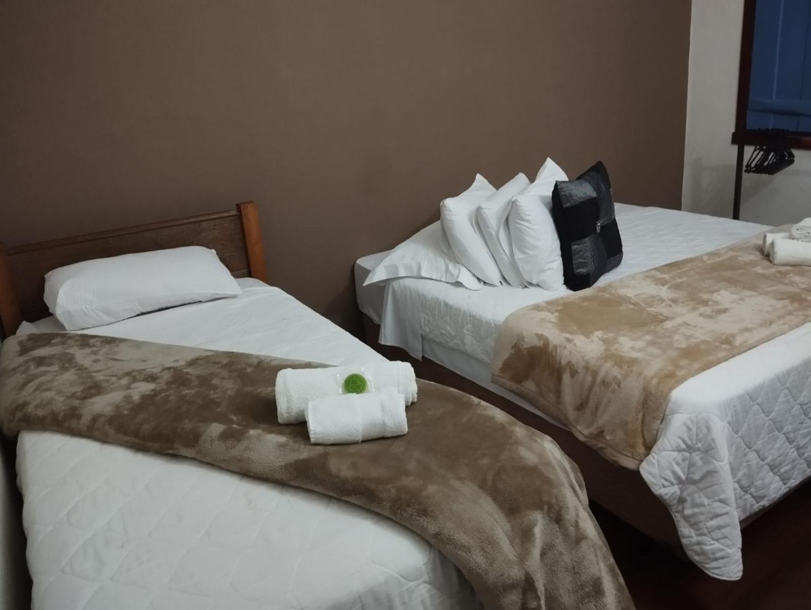Quarto Triplo com Vista para a Montanha