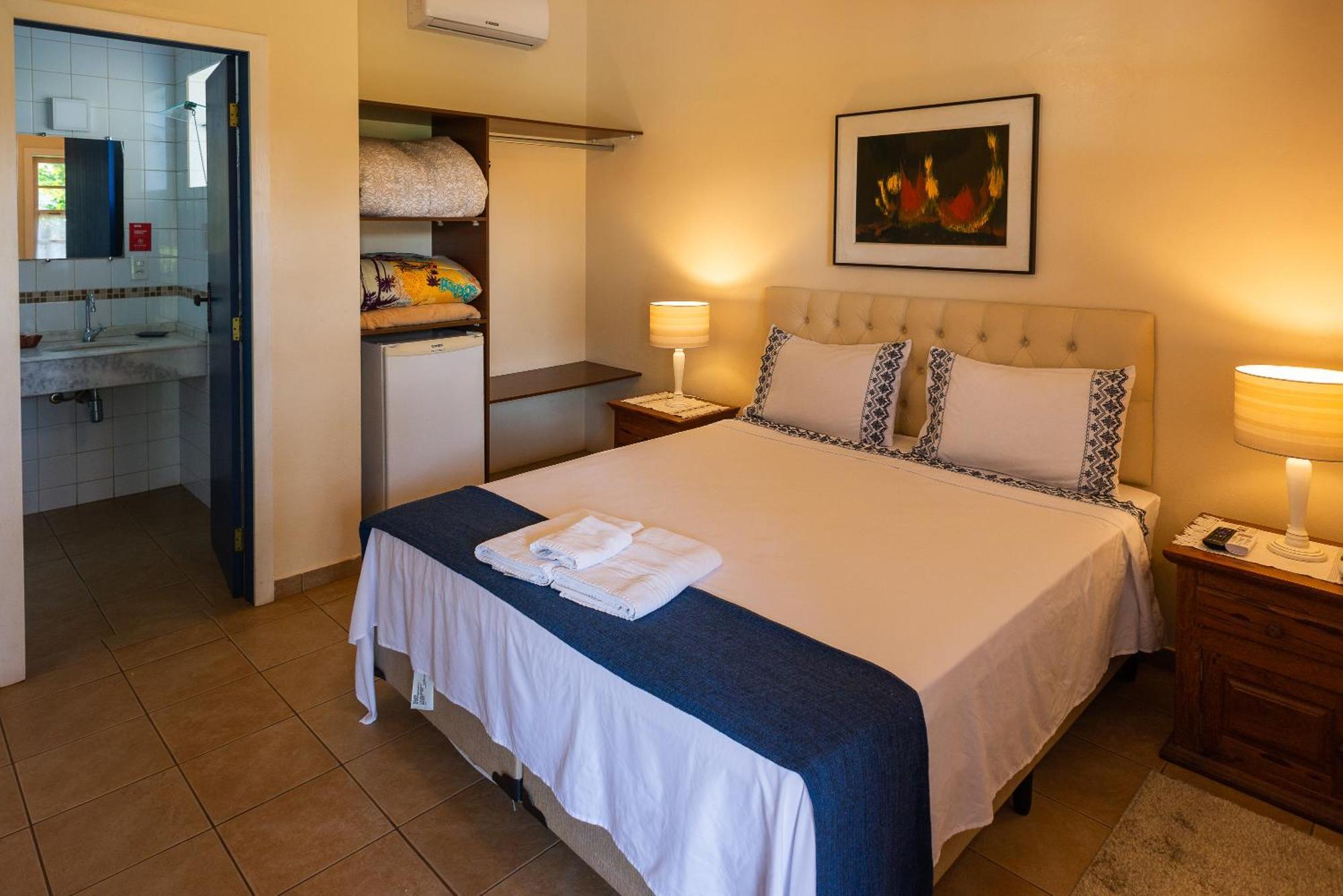 Quarto Duplo Deluxe (2 Adultos + 1 Criança)