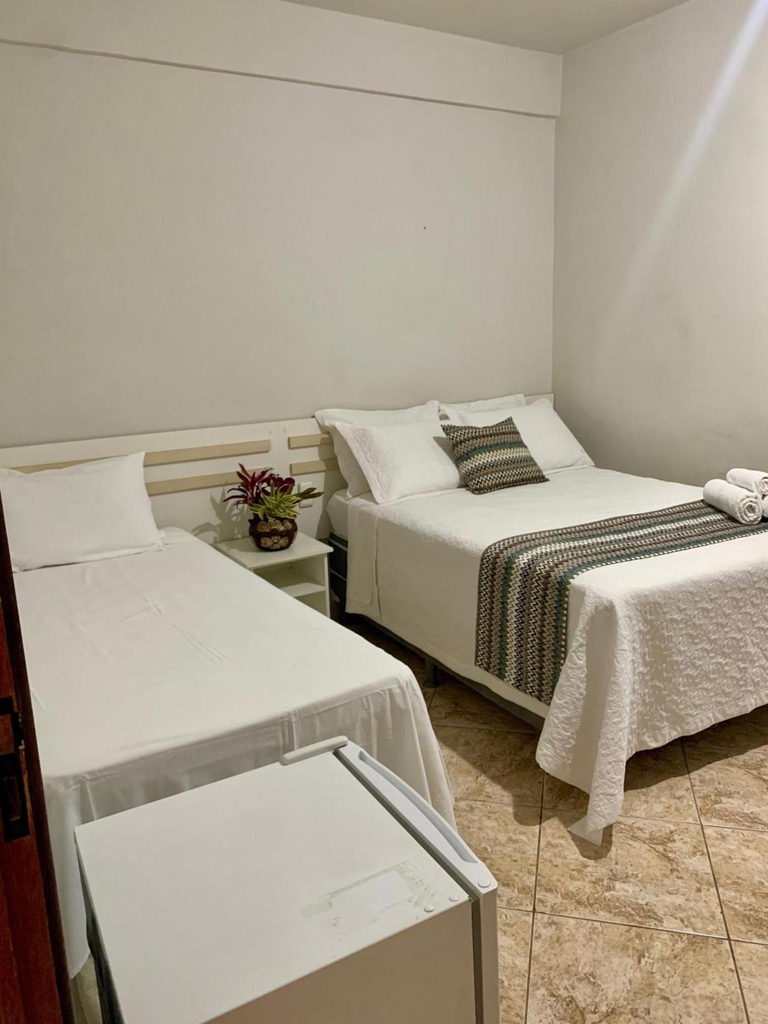 Quarto Triplo com Vista para a Piscina