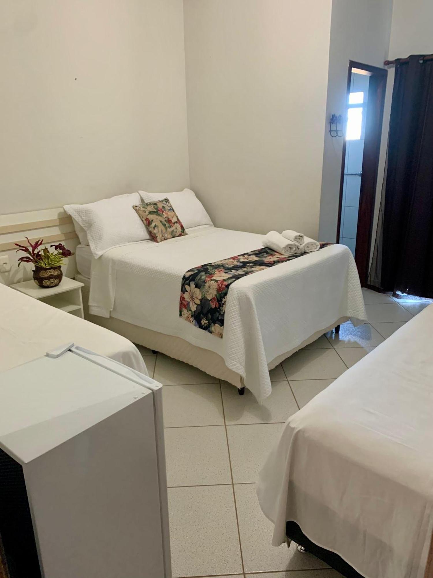 Quarto Triplo com Vista para a Piscina