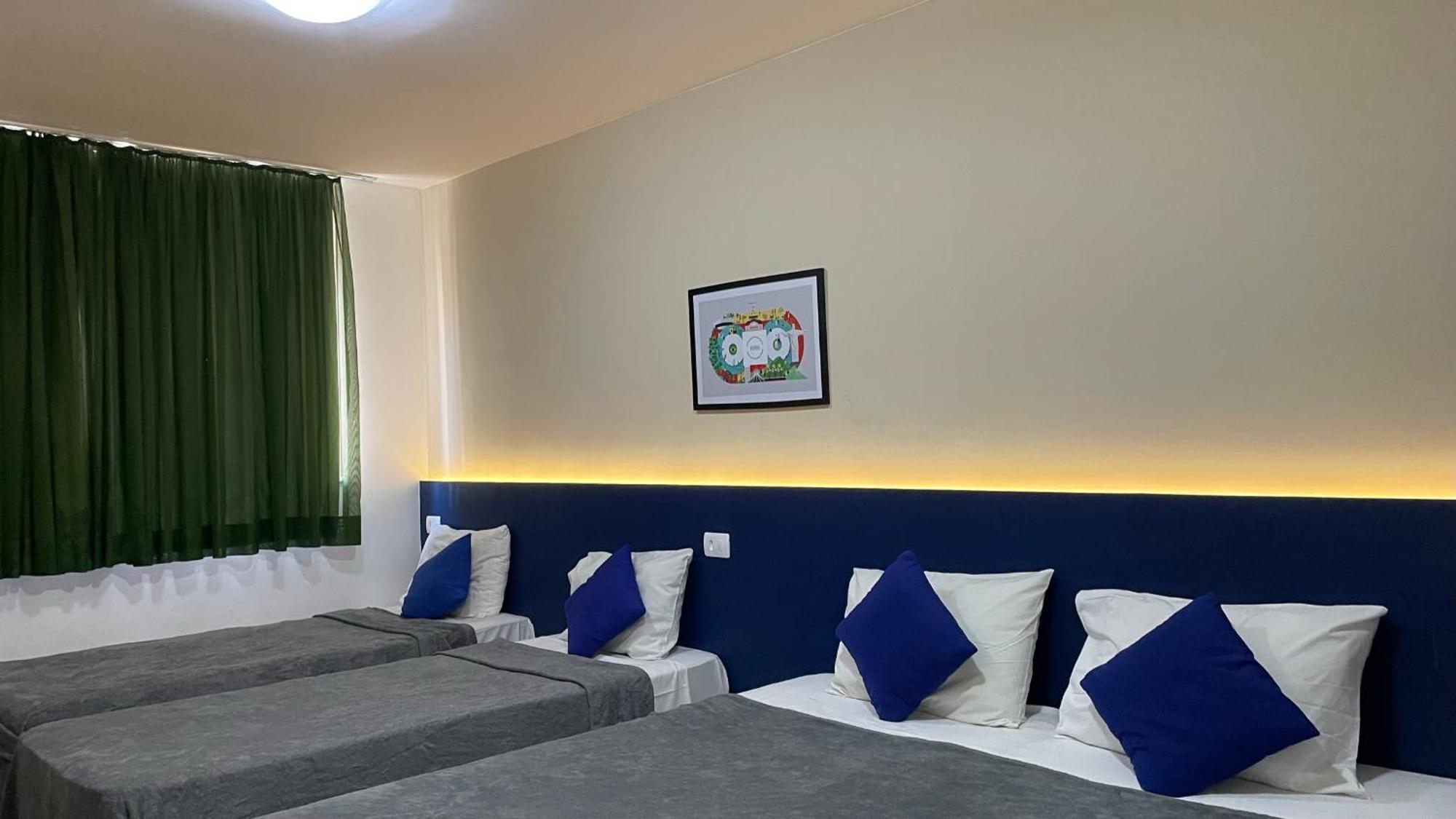 Quadruple Room 4 single beds