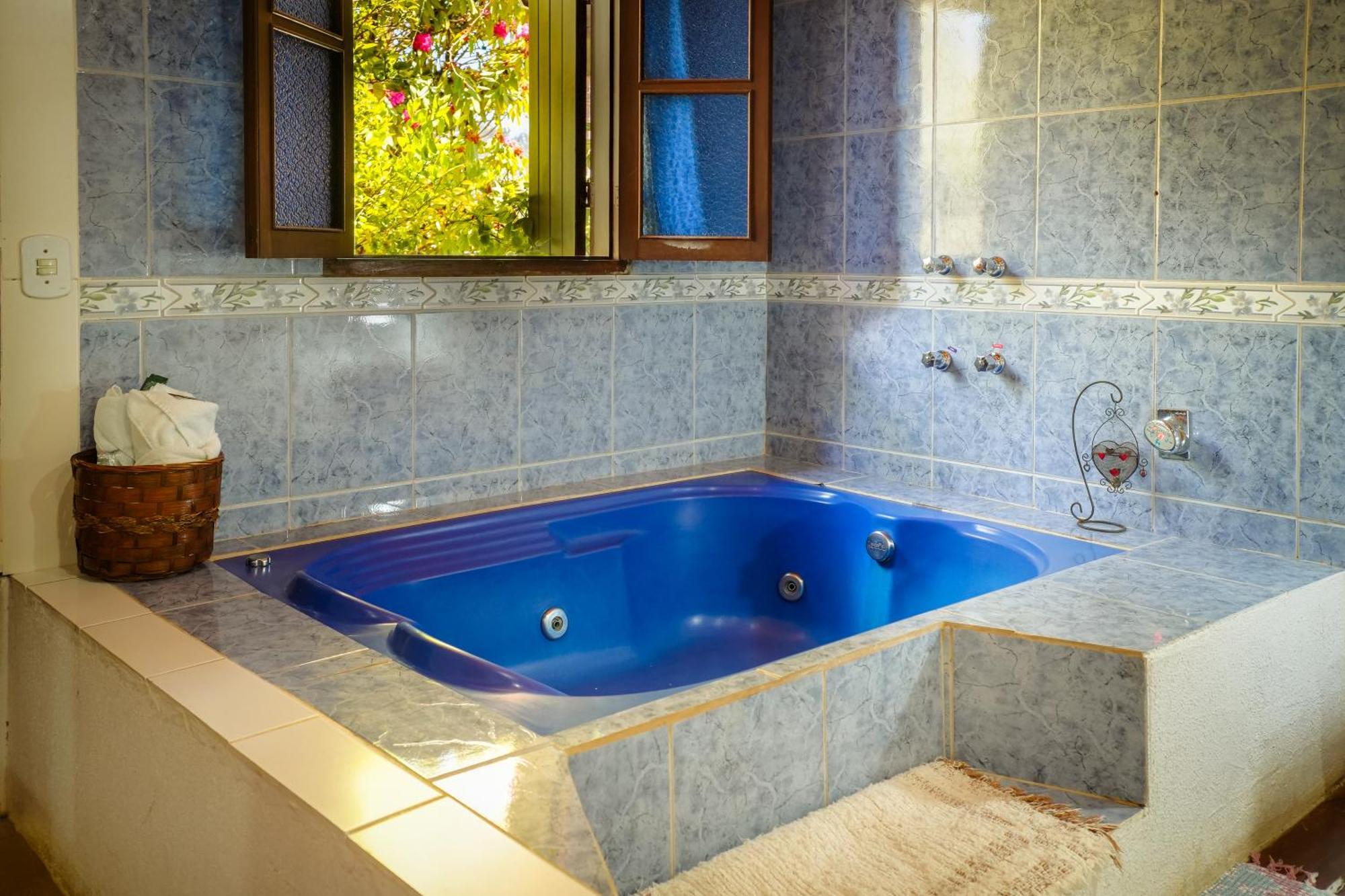 Quarto Deluxe com Banheira de Hidromassagem