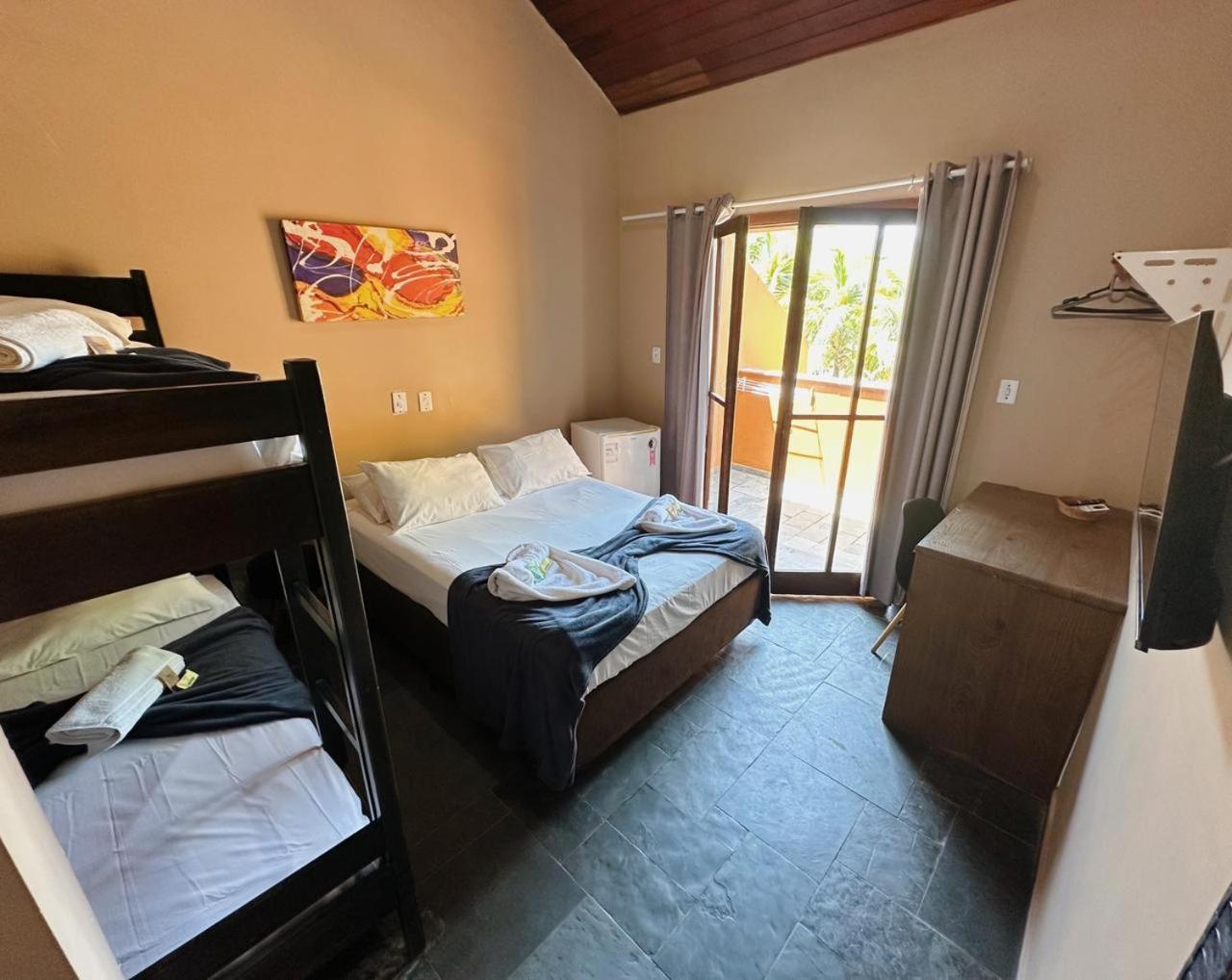 Quarto Quádruplo com Varanda
