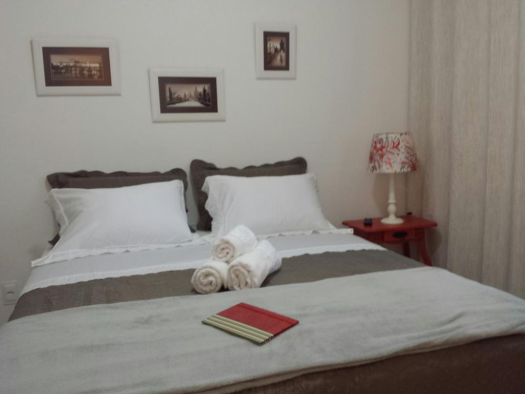 Quarto com Cama Queen-Size e Varanda