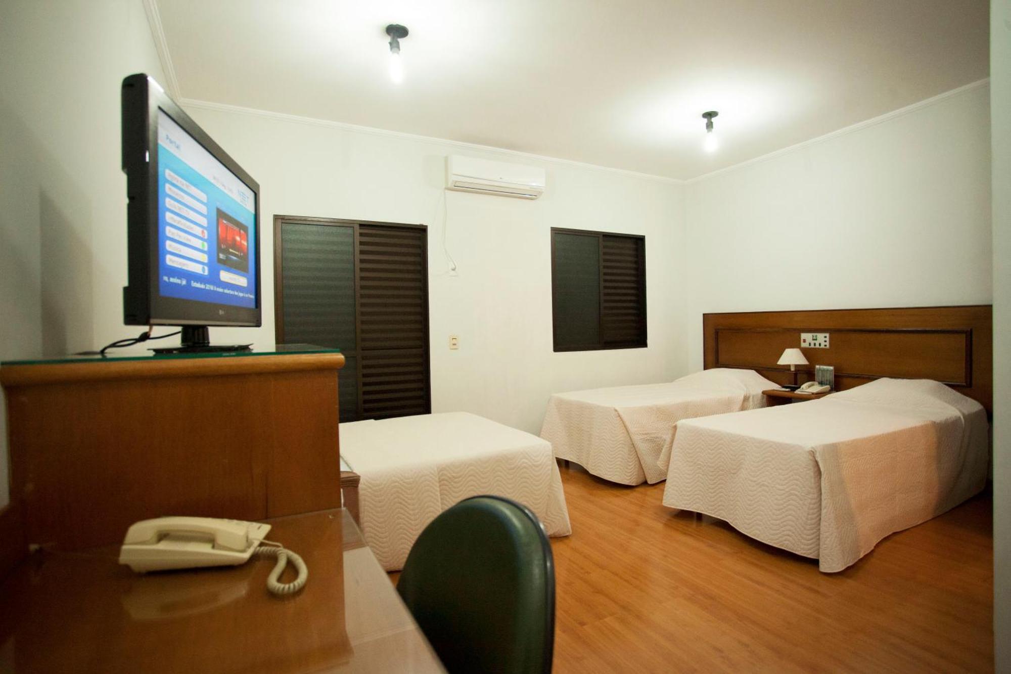 Deluxe Triple Room,713277991:JPEG