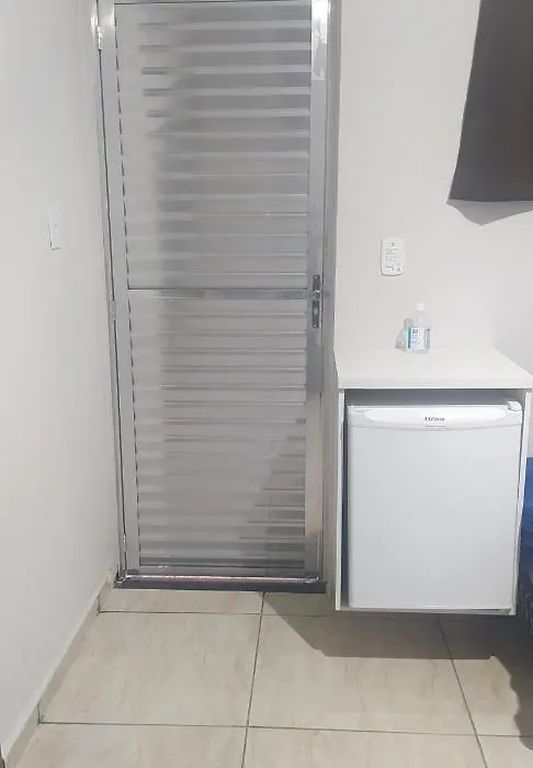 Pousada Quarto com tv,ar,frigobar,wifi e garagem-1