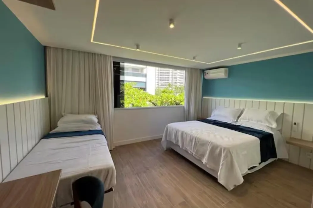 Ampla Suite Em Frente Ao Posto 6 Na Praia Da Barra-1