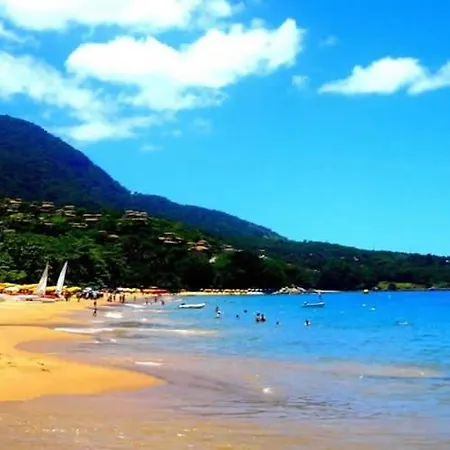 Suíte Pé na Areia- Espaço Independente na Praia do Curral com localização privilegiada - simplicidade e comodidade com o pôr do sol mais lindo de Ilhabela - melhor custo benefício para até 4 pessoas , na Av José Pacheco do Nascimento nº 7682-2