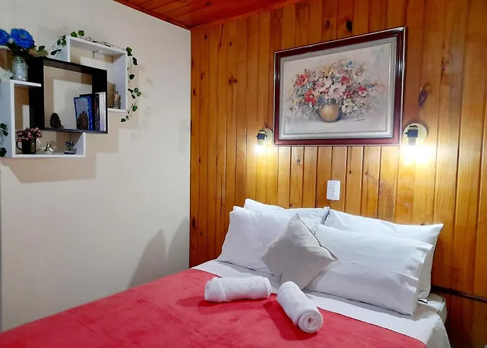 Apartamento Bela Vista - cozinha e suíte Campos do Jordão
